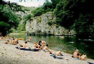  a swimming beach on the river